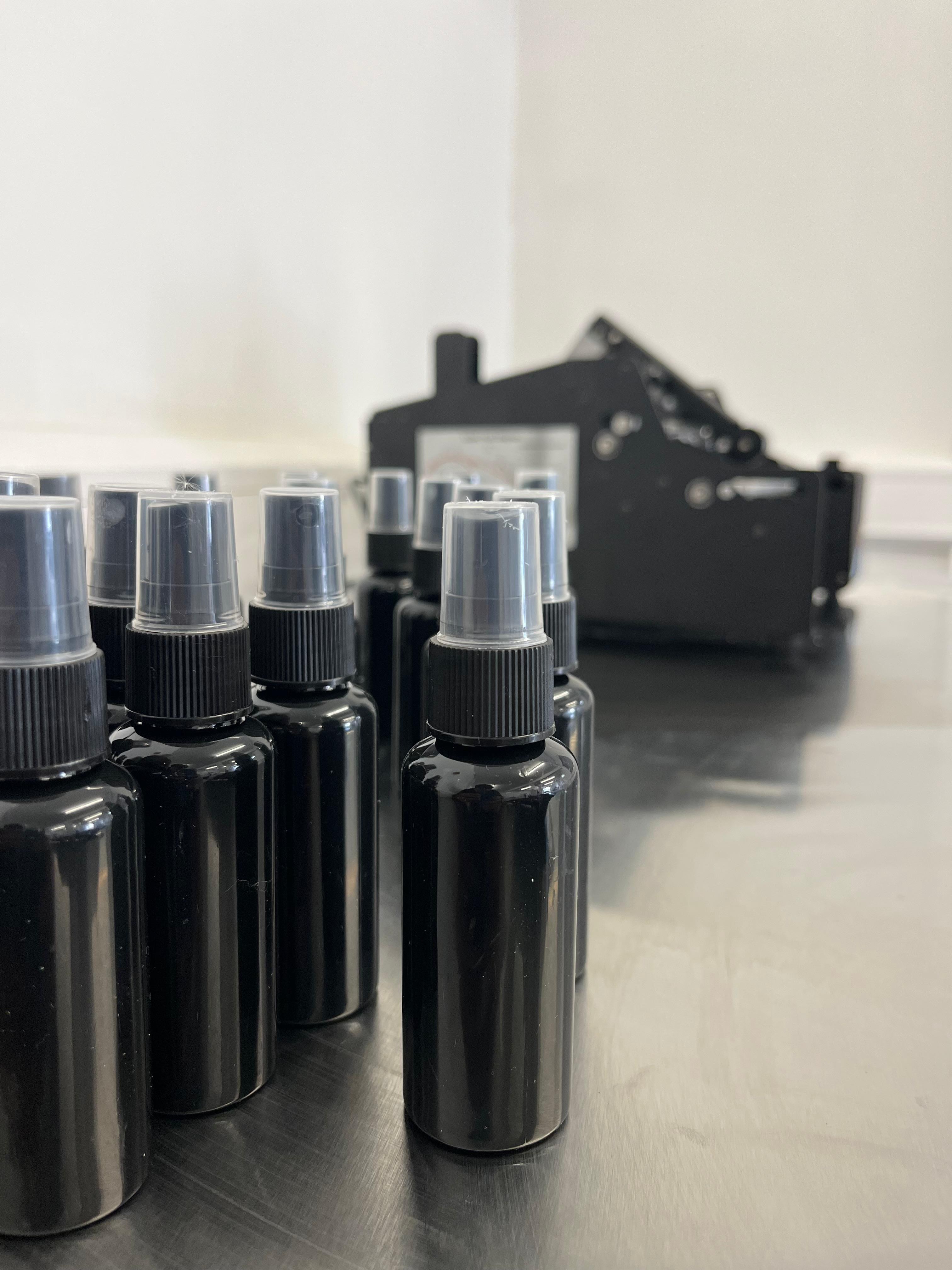 Retail bottles with precise label finish - Contract packing context.